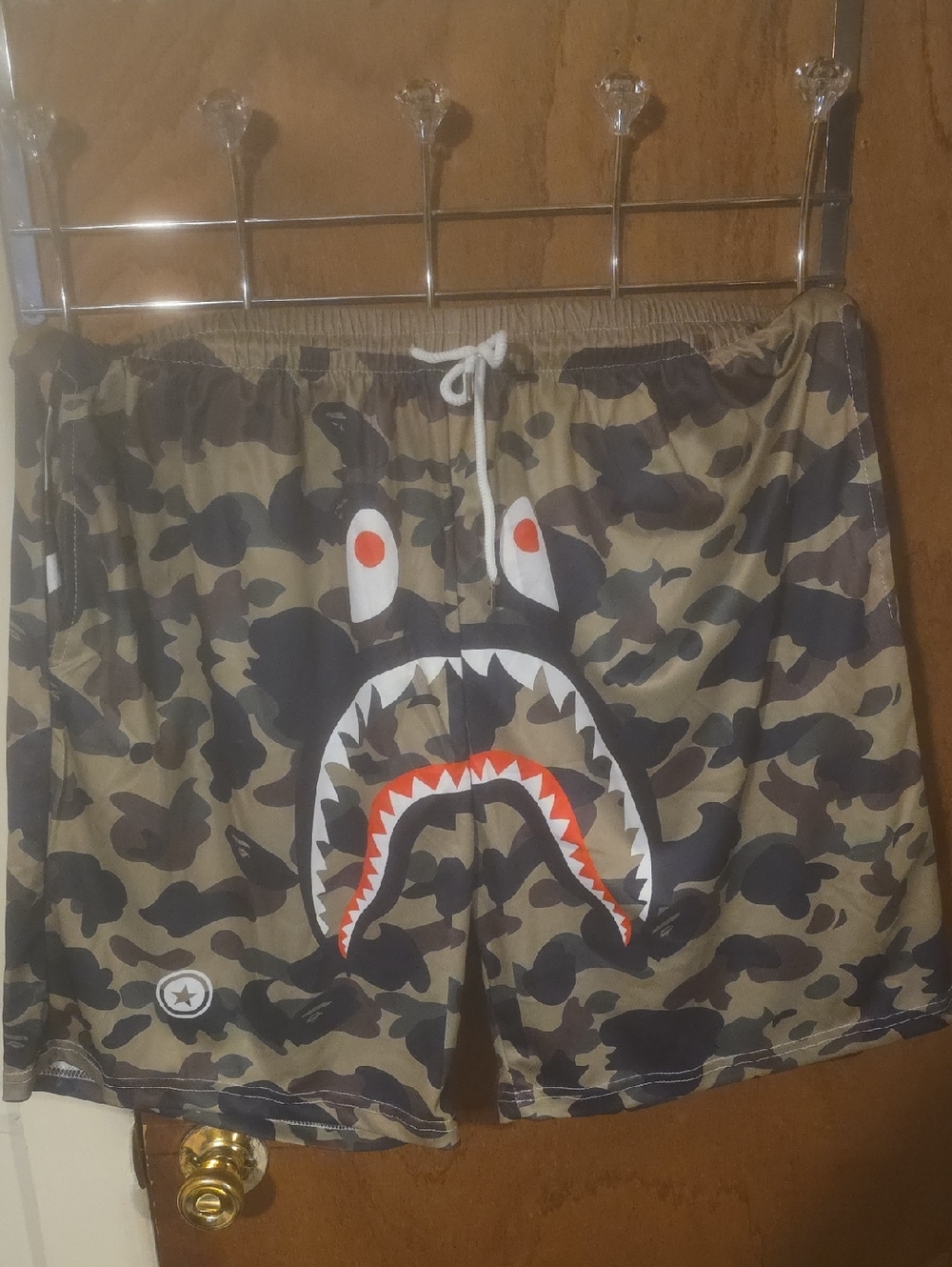 Bape Green Camo Shark Swim Shorts with Red Accent